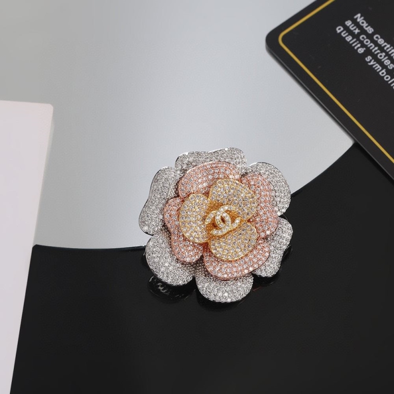 Ch**el brooches